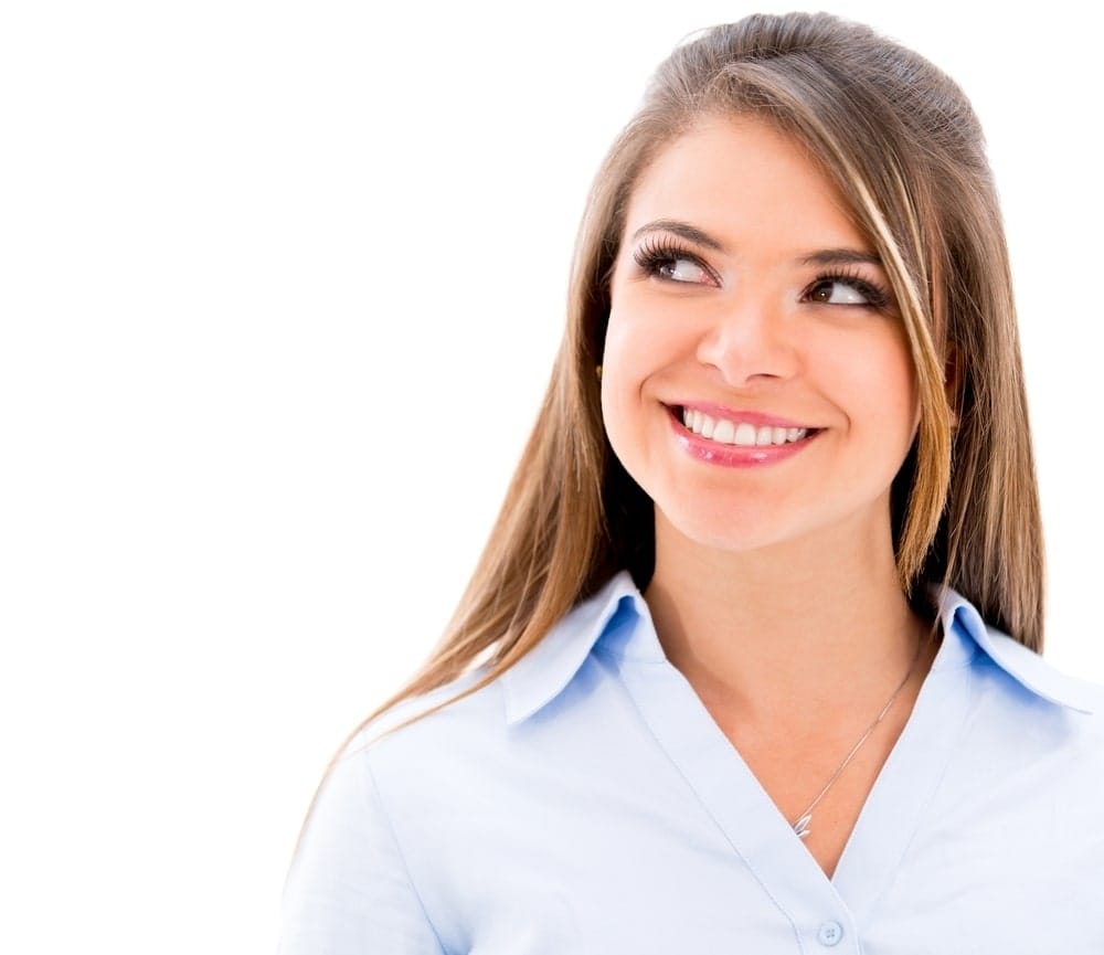 Thoughtful business woman looking up - isolated over white